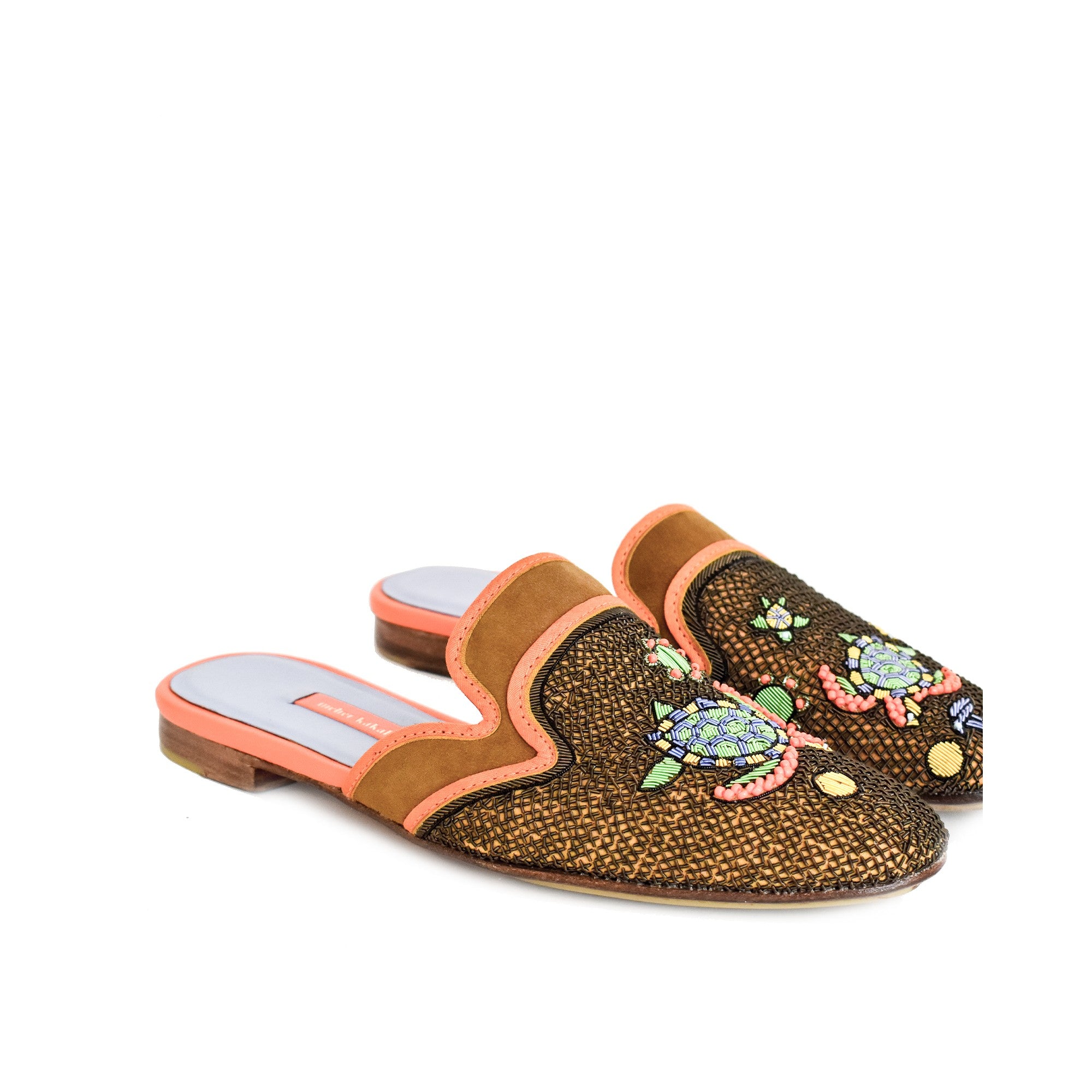 Darwin Slippers with metal coil turtle embroidery. Sustainable and elegant handmade slippers for your summer wardrobe.
