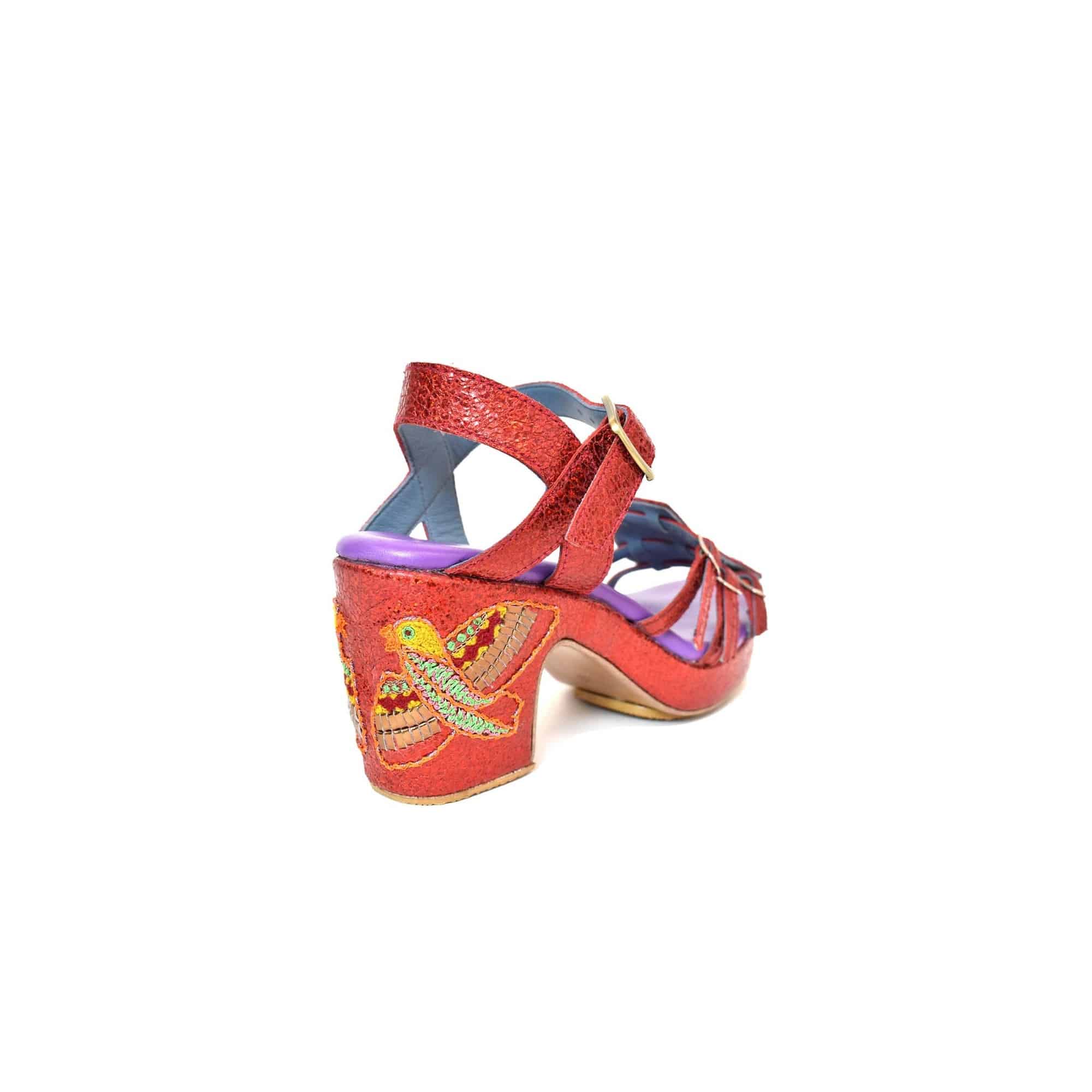 GOLD HOPPER splash poppy – rear angled view showing embroidered bird motif on sculpted heel