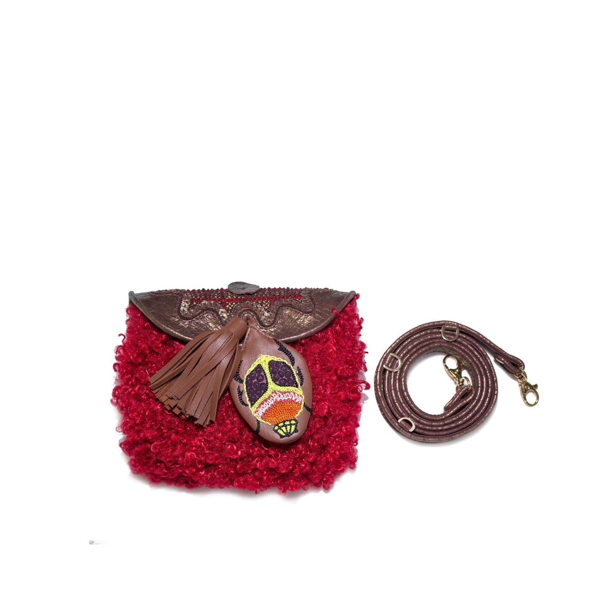 Mini accordion bag in pomegranate red faux shearling with hand-embroidered leather motif and detachable leather strap