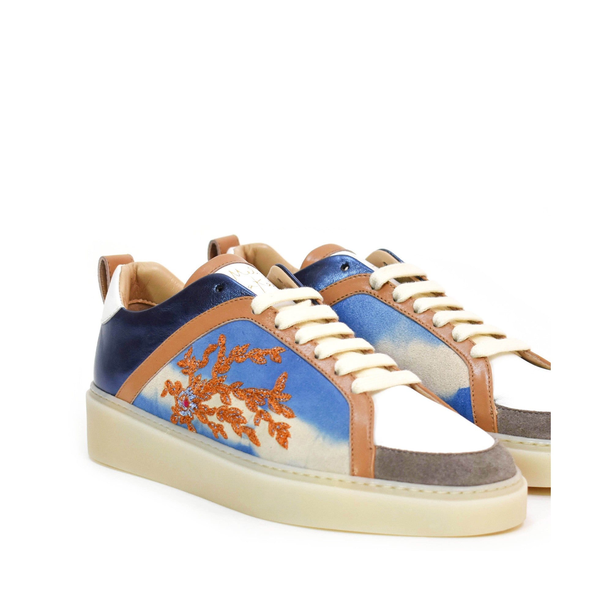 Front angle: Nereus embroidered nappa and suede low-top sneaker by Meher Kakalia