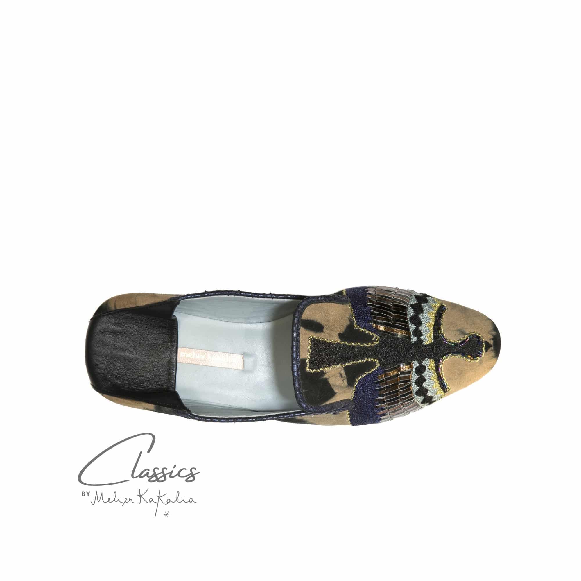 Stylish Meher Kakalia moccasins, handcrafted with tie-dye leather and silk embroidery. Sustainable and perfect for everyday.