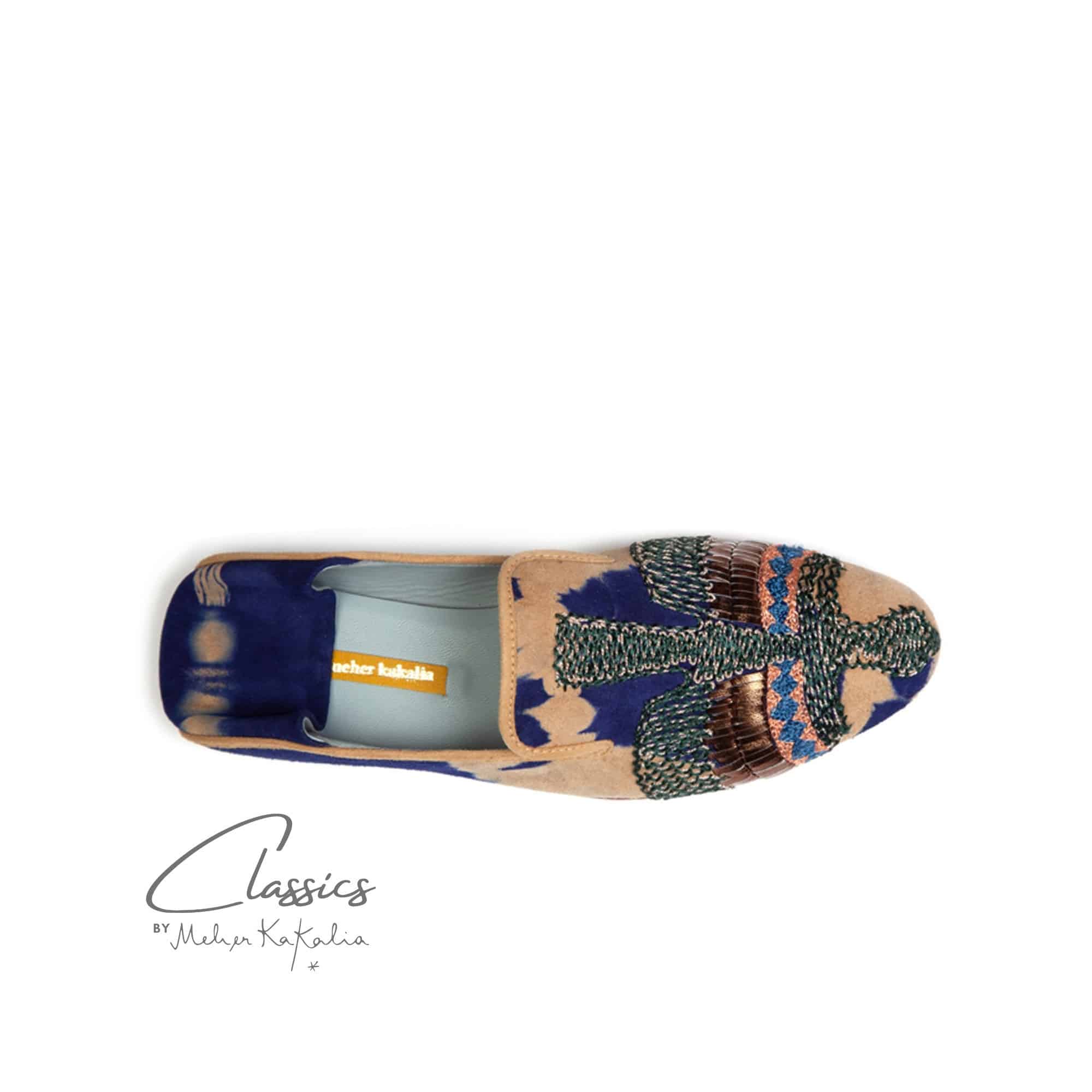 Stylish Meher Kakalia moccasins, handcrafted with tie-dye leather and silk embroidery. Sustainable and perfect for everyday.