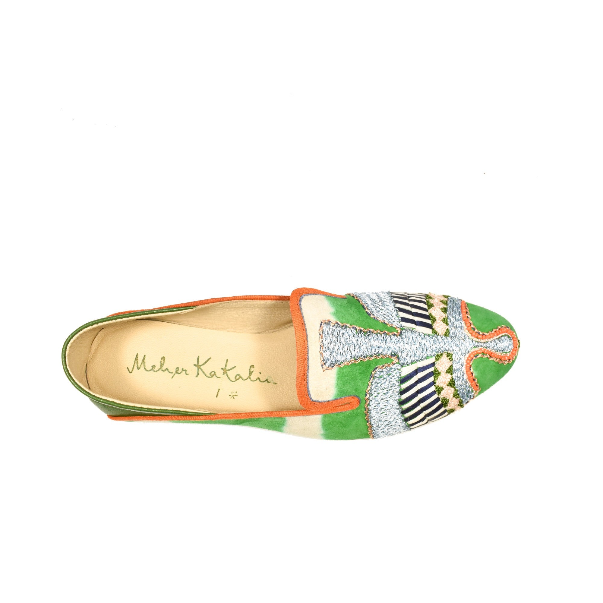 Meher Kakalia's luxurious tie-dye moccasins in green with detailed embroidery, perfect for a colourful, unique summer style.