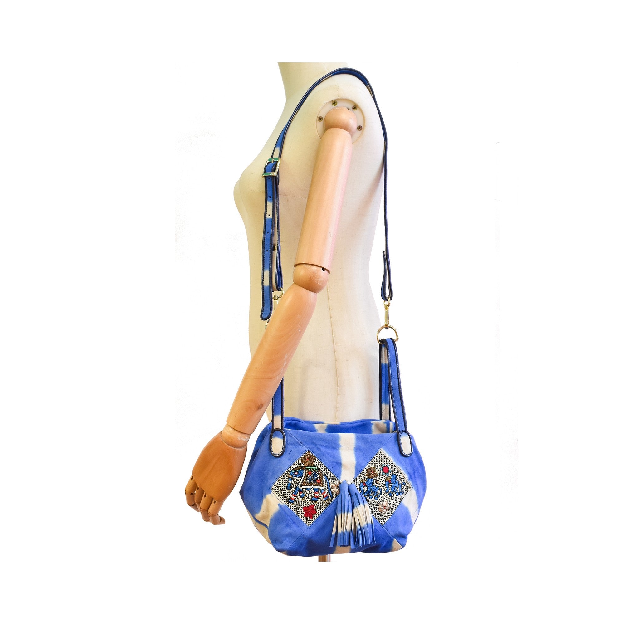 Embroidered leather shoulder bag in cobalt blue and ivory