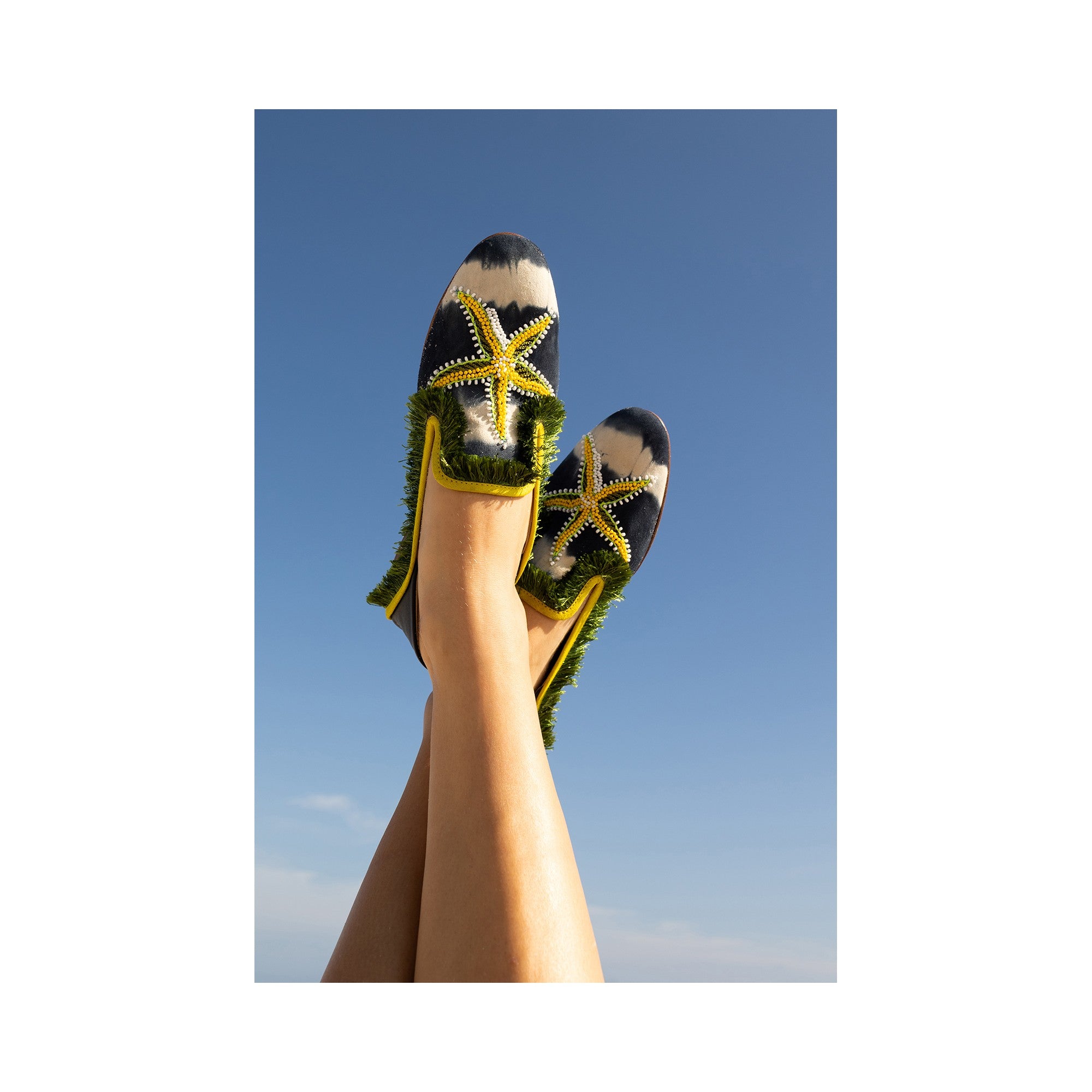 Sustainable and stylish Mazu Moccasin with hand-beaded starfish details, ideal for both casual and elegant occasions.