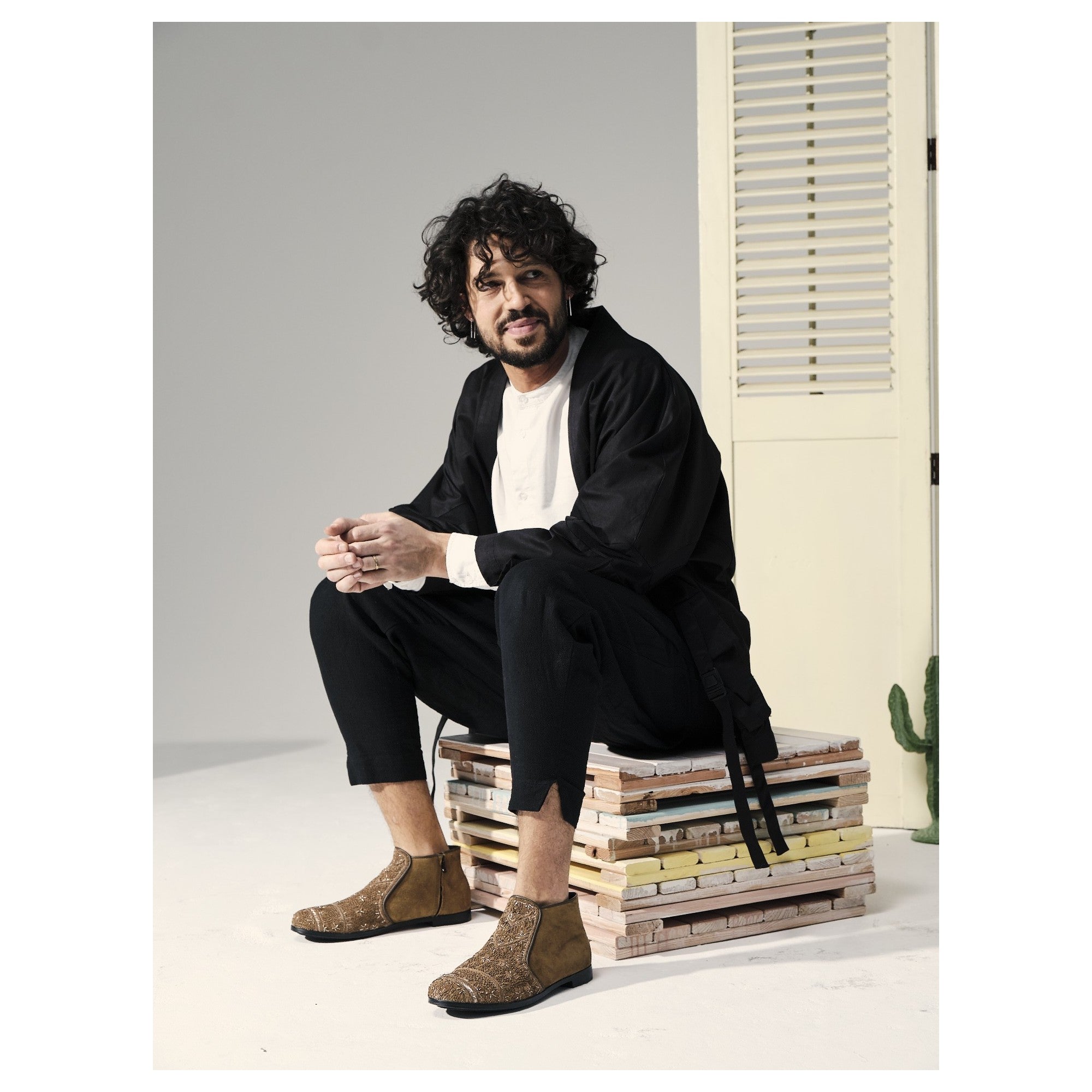 Handmade men’s suede boot with geometric embroidery by Meher Kakalia