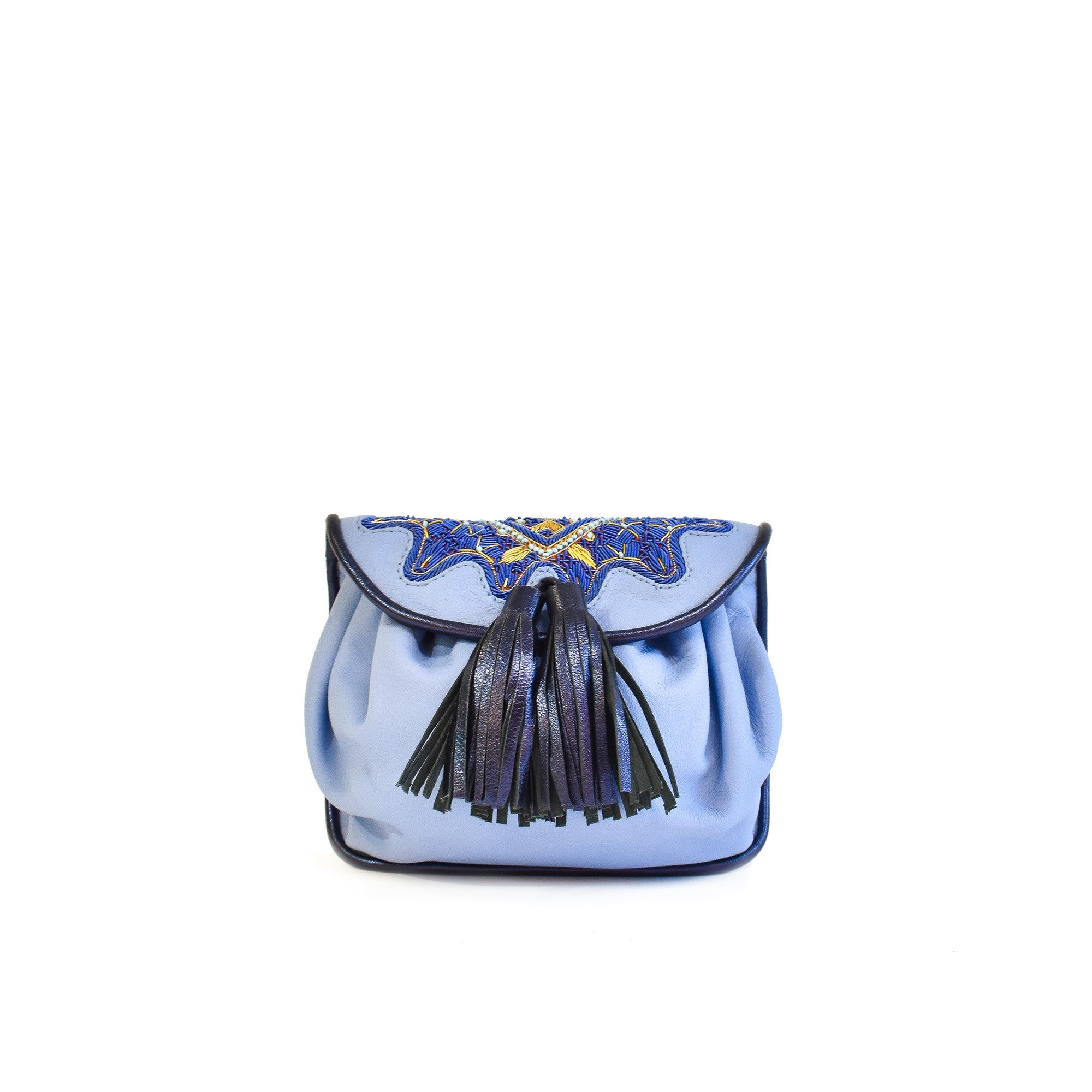 Small blue leather shoulder bag with adjustable strap and tassel detail.