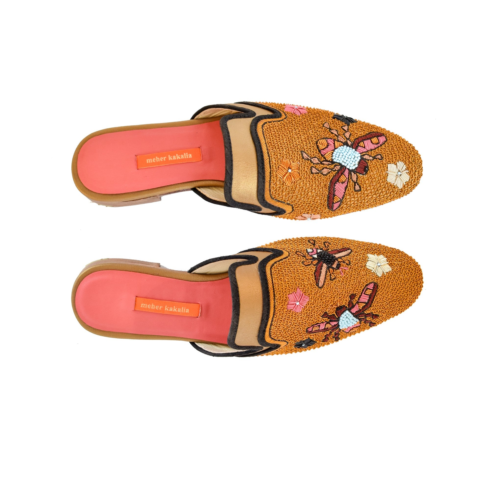 Luxury embroidered slippers with floral designs, hand crafted using eco leather and metal coil embroidery.